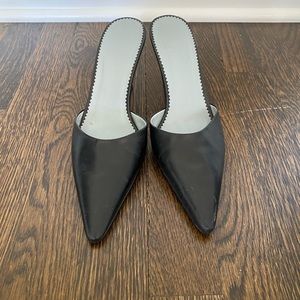 BCBGirls black kitten heel slides/mules in size 7